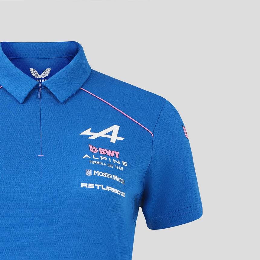 Blue women's polo shirt with Alpine and BWT logos on front.