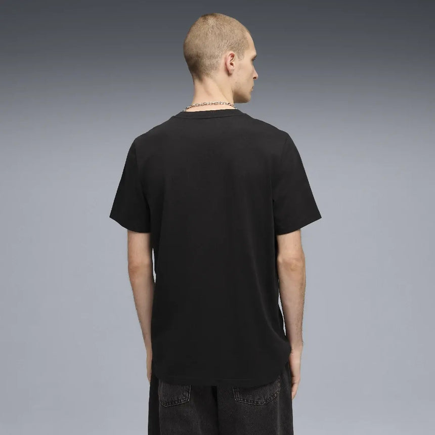 Black T-shirt back view worn.