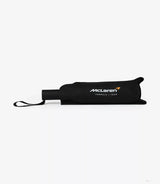 Black folded McLaren umbrella with white logo