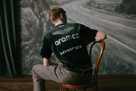 Green Aston Martin shirt vertical view with logos.