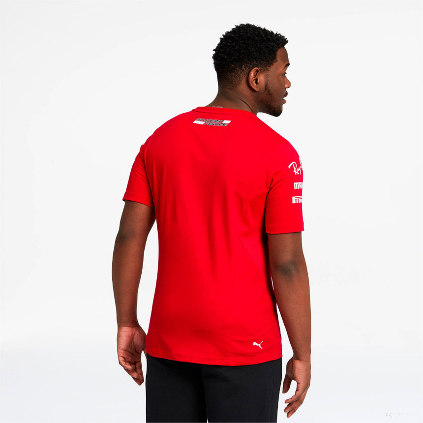 Model wearing red Ferrari polo shirt with back lettering