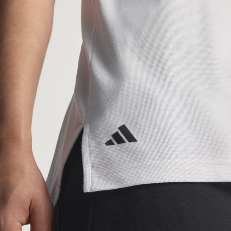 Adidas logo visible at bottom of white t-shirt.