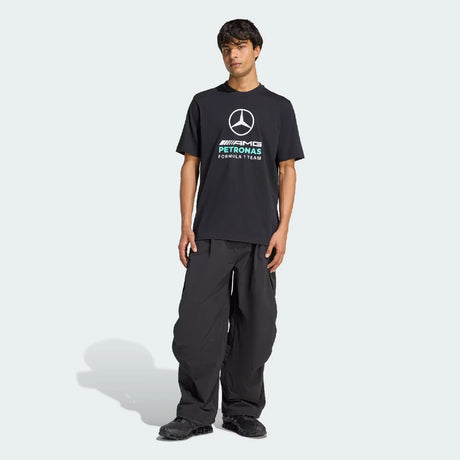 Black t-shirt front view worn by standing man