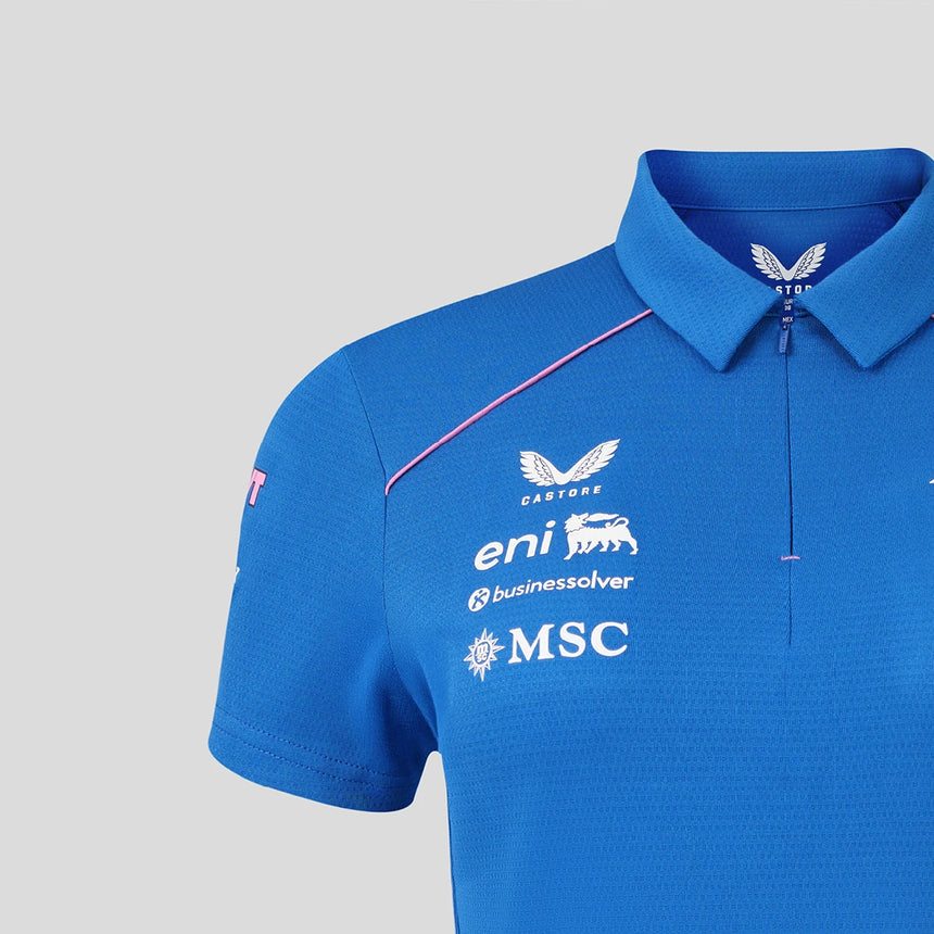 Blue women's polo shirt with Castore logo at the neck.