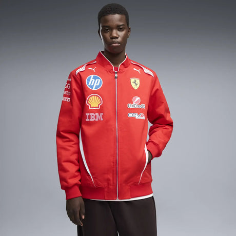 Red Ferrari jacket worn by model with visible logos.