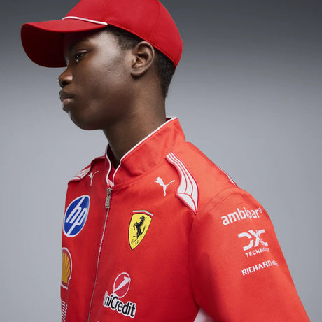 Red Ferrari jacket side view with model.