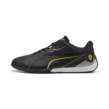 Black PUMA shoe with Ferrari logo and yellow stripe side view
