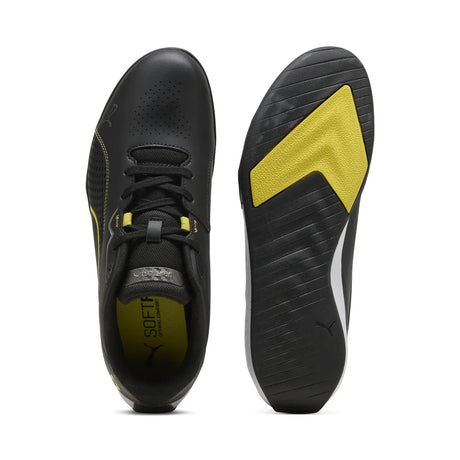 Black PUMA shoe with yellow sole top view