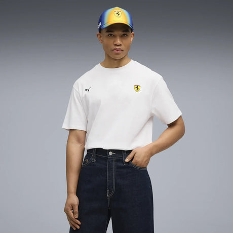 White T-shirt with Ferrari logo worn by model.