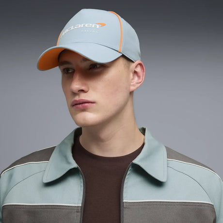 Blue McLaren cap worn by male model