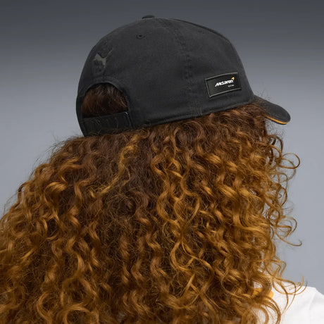 Black McLaren cap back view with logo.