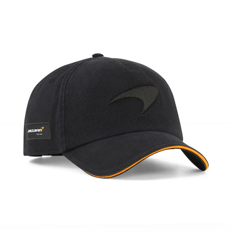 Black McLaren cap with logo side view.