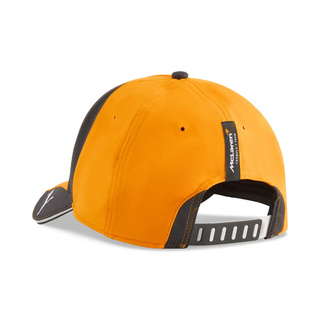 Black McLaren cap back view with black rear stripe.