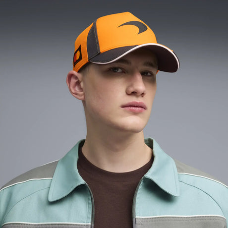 Yellow McLaren cap worn by boy model.