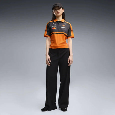 Woman wearing T-shirt with visible black pants