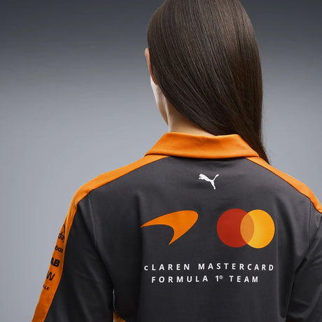 Orange and black T-shirt back view with McLaren logo