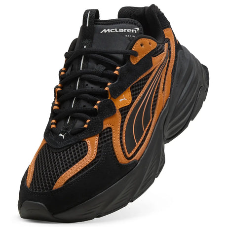 PUMA shoe front view in black and orange