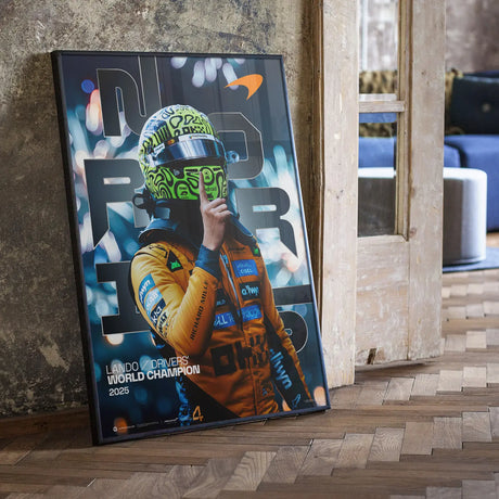 Framed Lando Norris poster indoors.