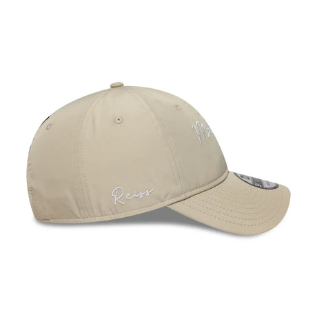 Beige cap with McLaren Racing and Reiss logos.