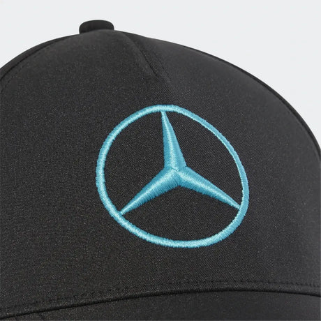 Black cap with Mercedes emblem.