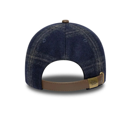 Back view of New York Yankees cap with brown leather strap.