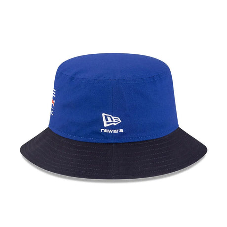 Blue bucket hat with NEW ERA® logo and Red Bull Racing branding.