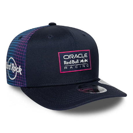 Blue Red Bull cap with Hard Rock logo, side view.