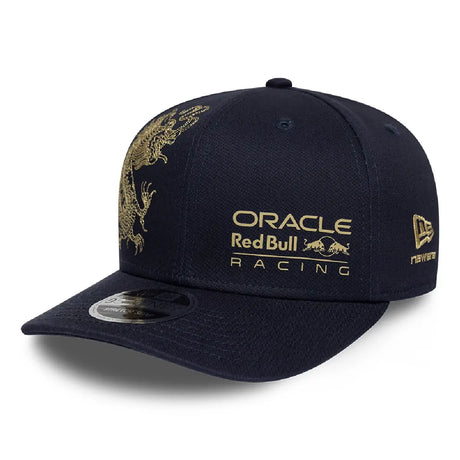 Blue baseball cap with gold dragon design by NEW ERA®.