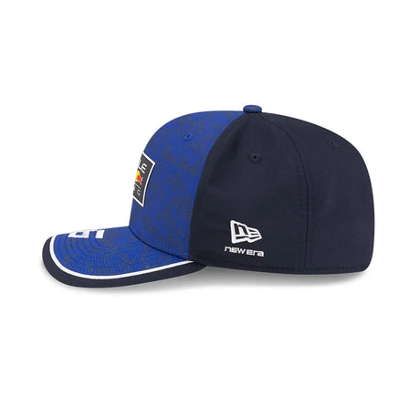 Blue Red Bull cap side with ORACLE logo.
