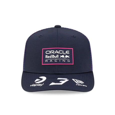 Red Bull cap front with blue grid pattern.