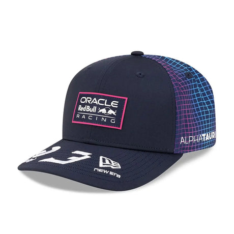 Red Bull cap front with blue grid pattern.