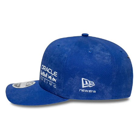 Blue cap side view with ORACLE and RACING logos